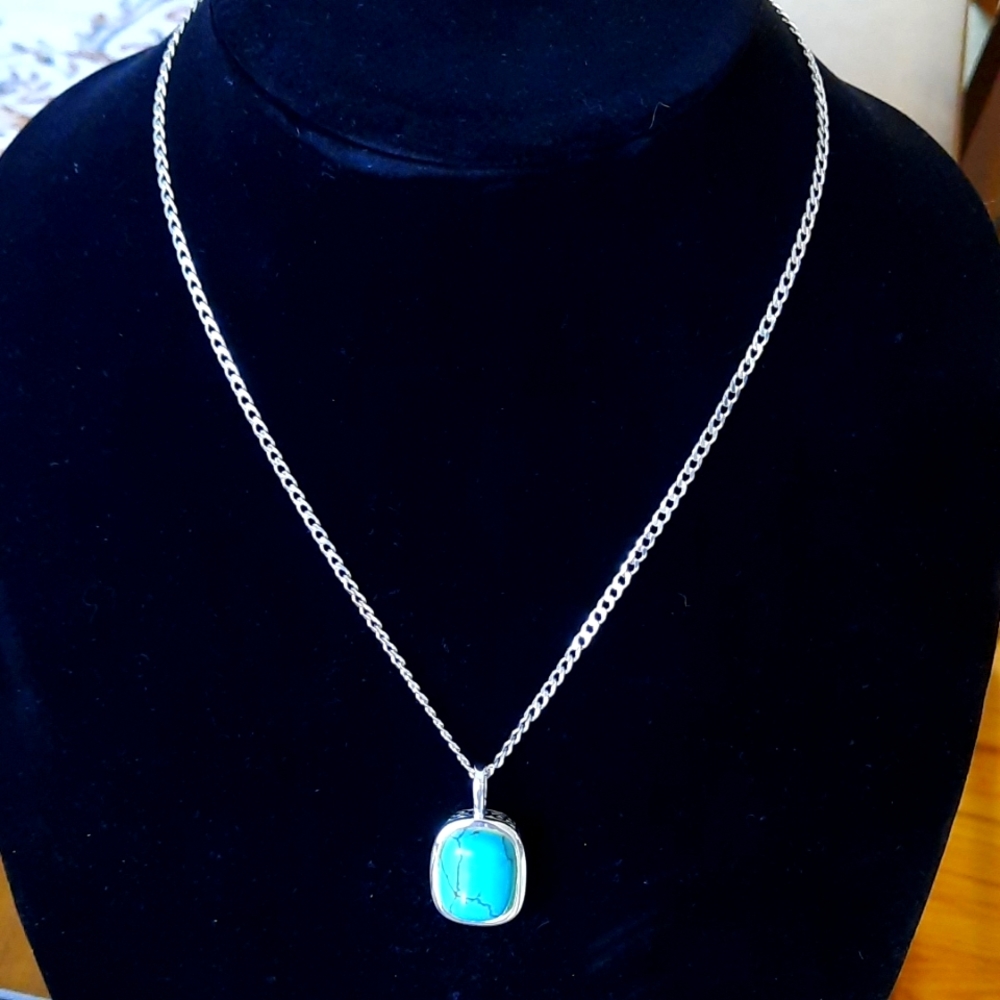 925 sterling silver chain with sterling and turquoise pendant. Pre-owned.